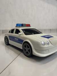 Іграшка поліцейська машина