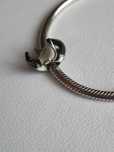 Srebrny charms orka