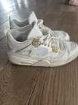 Buty sneakersy Nike Air Jordan 4 Retro Metallic Gold 43