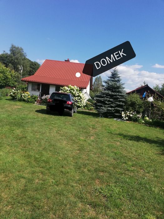 Działka z domkiem nad jeziorem