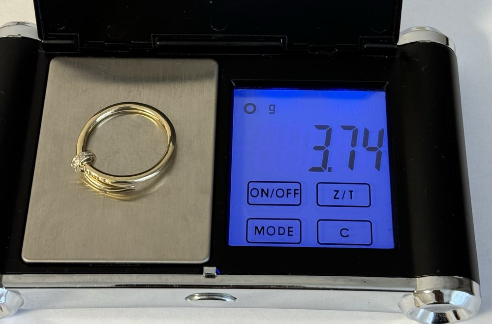 тое кольцо "Cartier" с бриллиантами