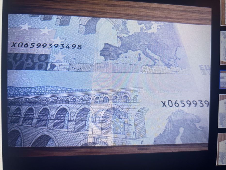 Nota de 5€ com erro de corte.