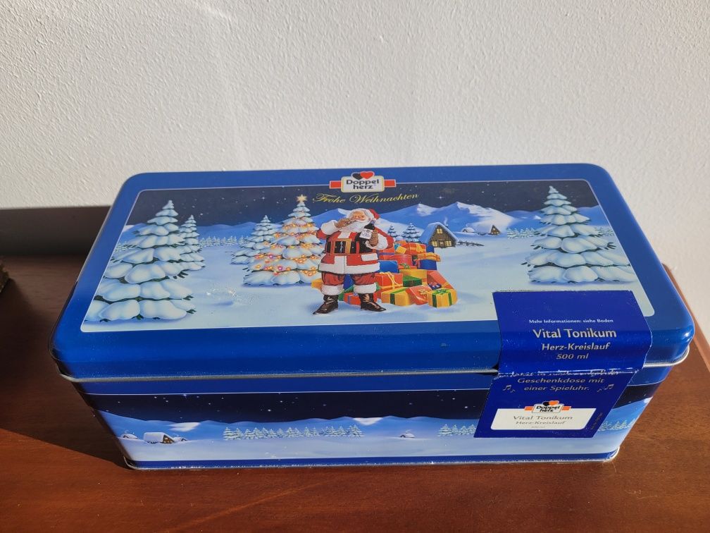 Pudełko metalowe z motywem świątecznym z nakręcaną pozytywką