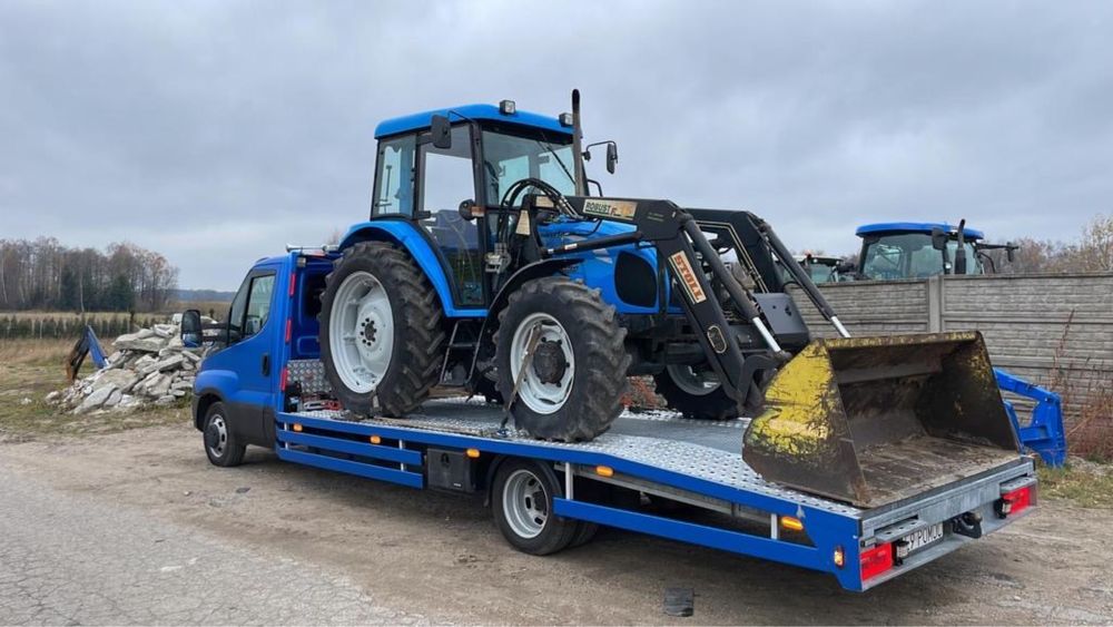 Pomoc drogowa 24h /7  Holowanie Usługi transportowe Transport Maszyn