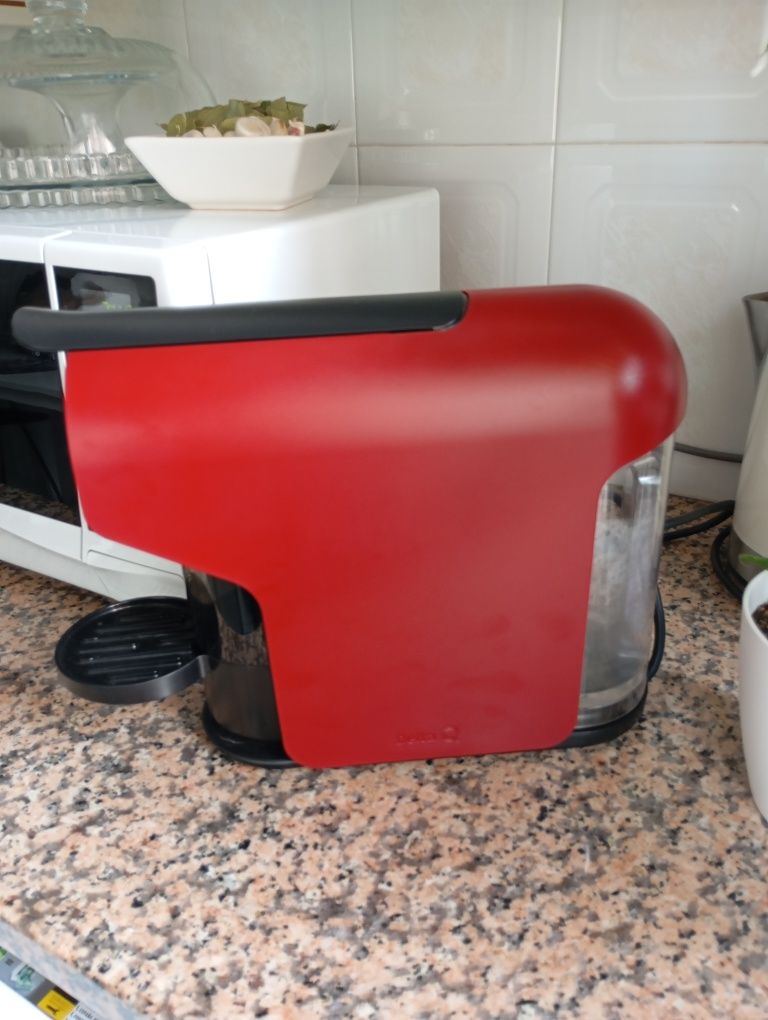 Máquina de café Delta.