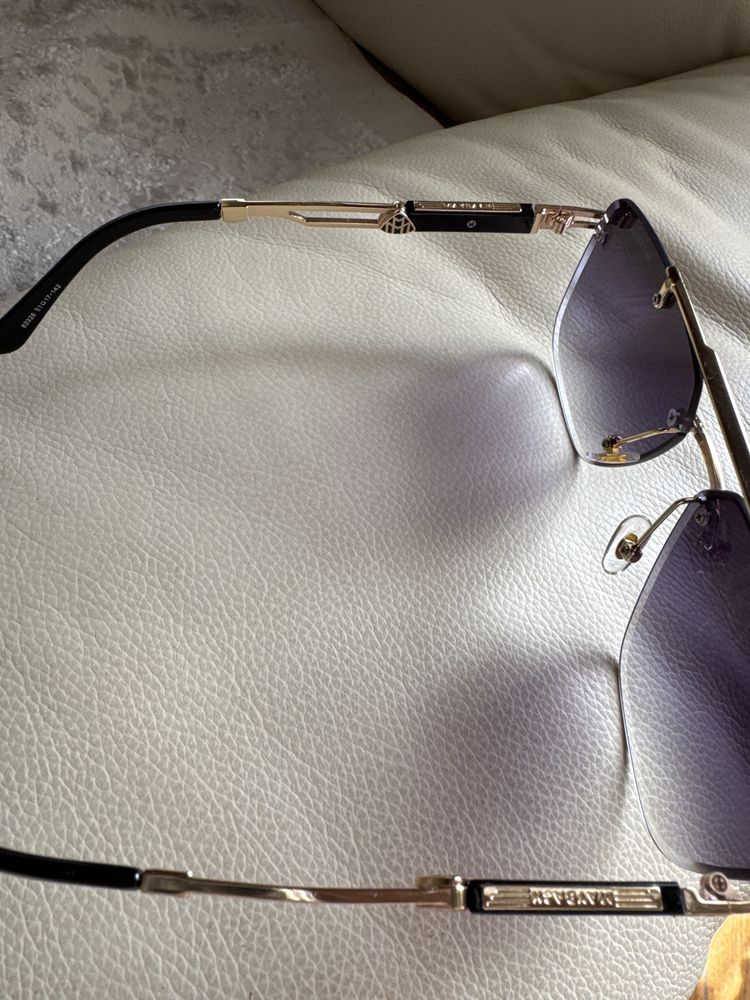 Окуляри 2 пари , сонцезахисні MAYBACH та LOEWE