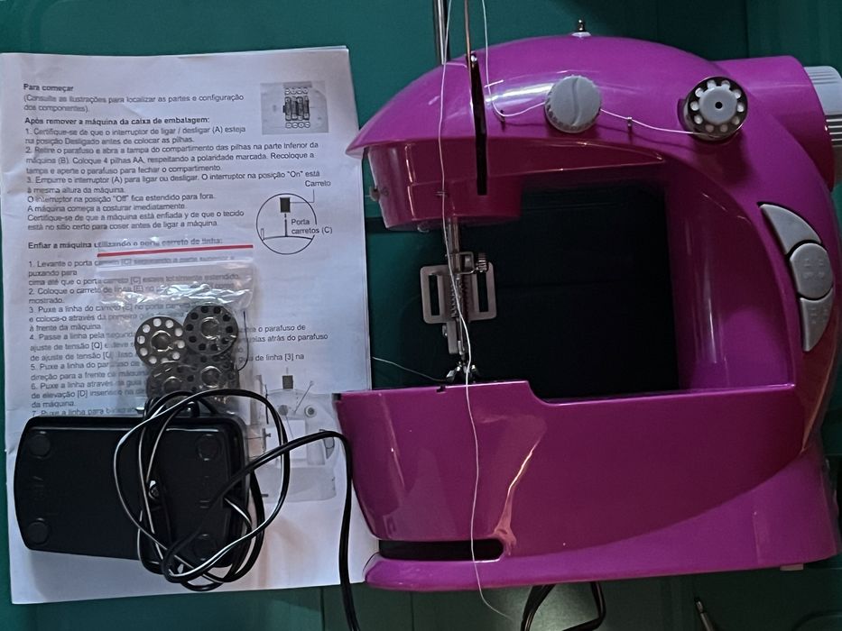 Maquina de coser de brinquedo