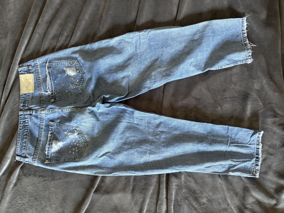 Рваные джинсы женские