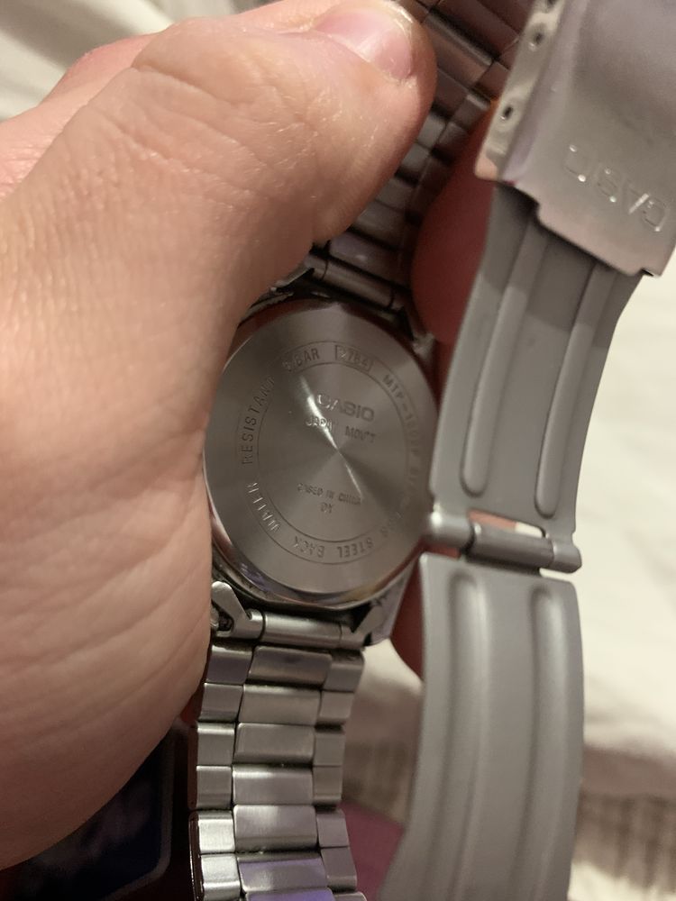 Relogio casio prateado e azul