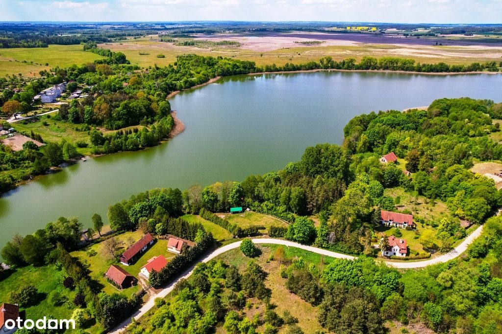 Piękne działki w otoczeniu krzewów z dostępem do jeziora Buwełno