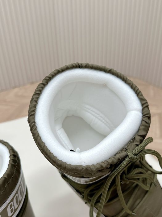 Чоботи, снігоходи, мунбути Moon Boot