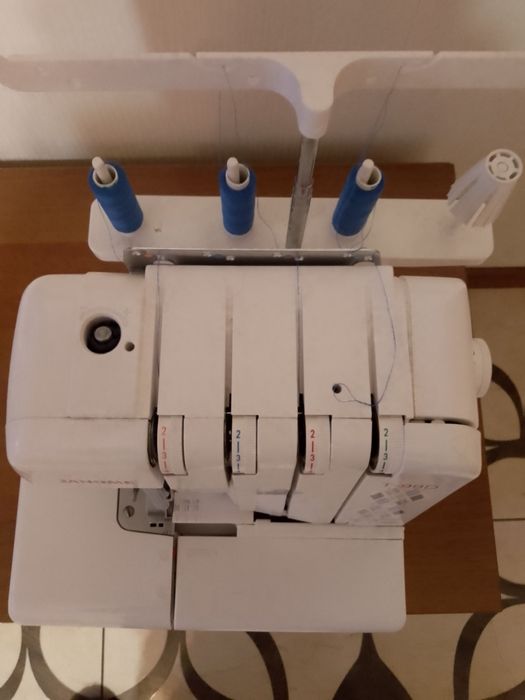 Продам швейную машинку оверлок JANOME  T-99D