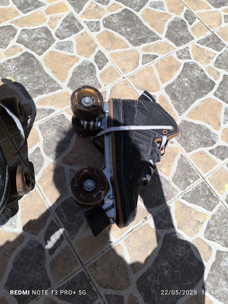 Patins de quatro rodas