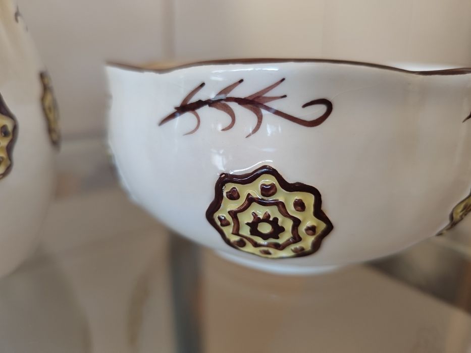 Conjuntos pintados à mão