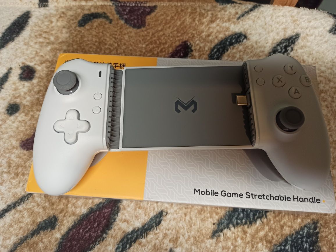 Memo S3 mobile game stretchable handle