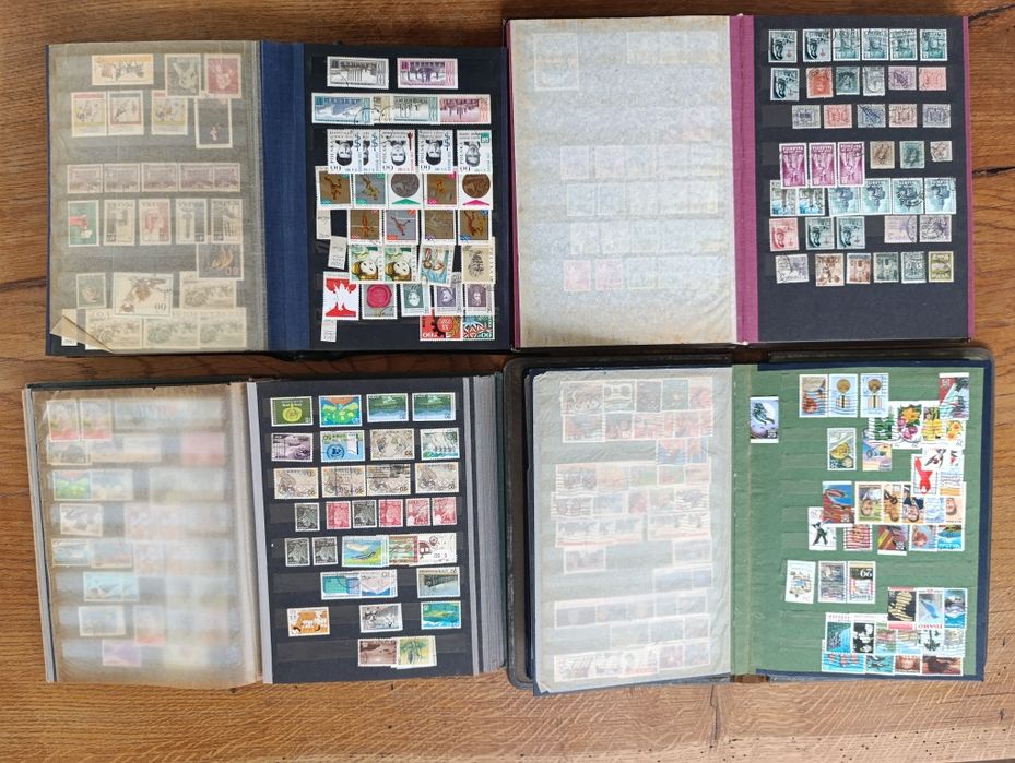 4 duże klasery ze znaczkami cały świat