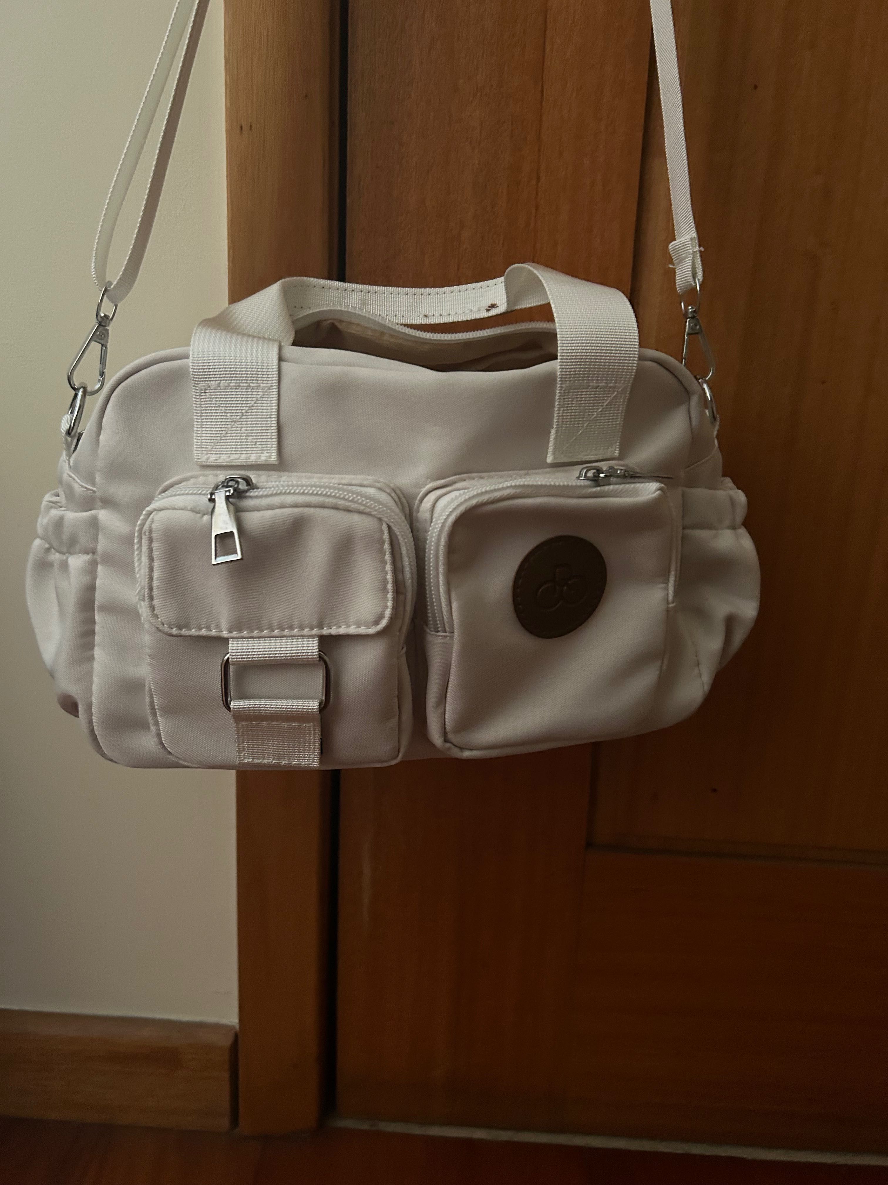 Bolsas, carteiras a tiracolo