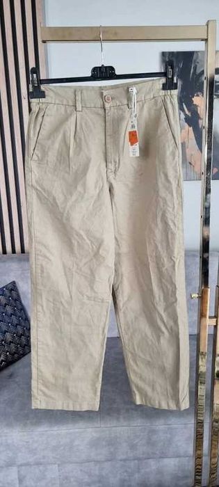 Bawełniane spodnie chino Reserved r.158