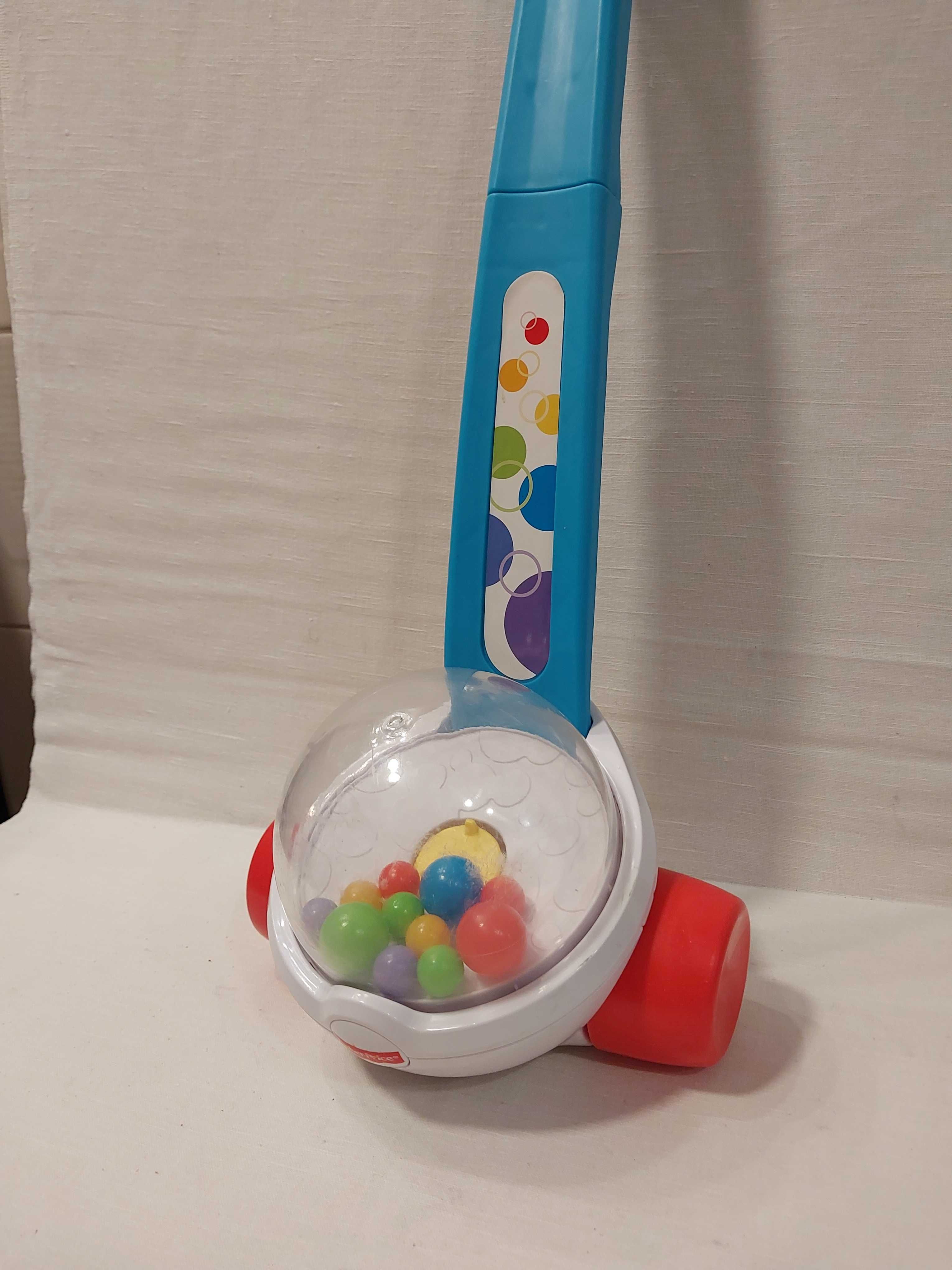 Fisher Price_Pchacz/ jeździk z podskakującymi kulkami