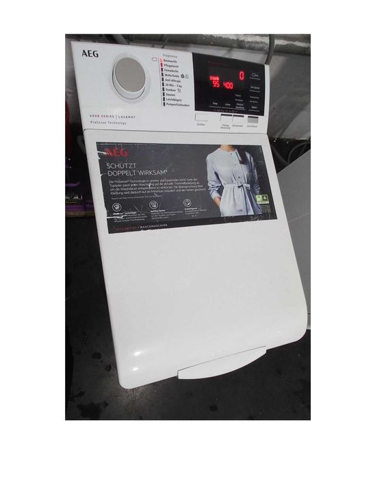 Пральна машина AEG L6TBA664 верхнє (вертикальне) 6кг а+++