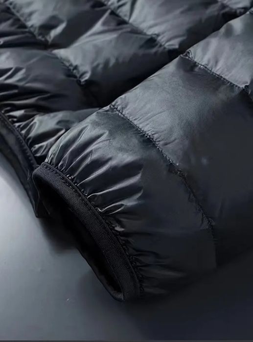 Мужской фирменный пуховик,отличное качество. Размер М, L