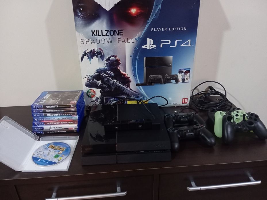 PS4 500Gb em caixa, 2 comandos e jogos