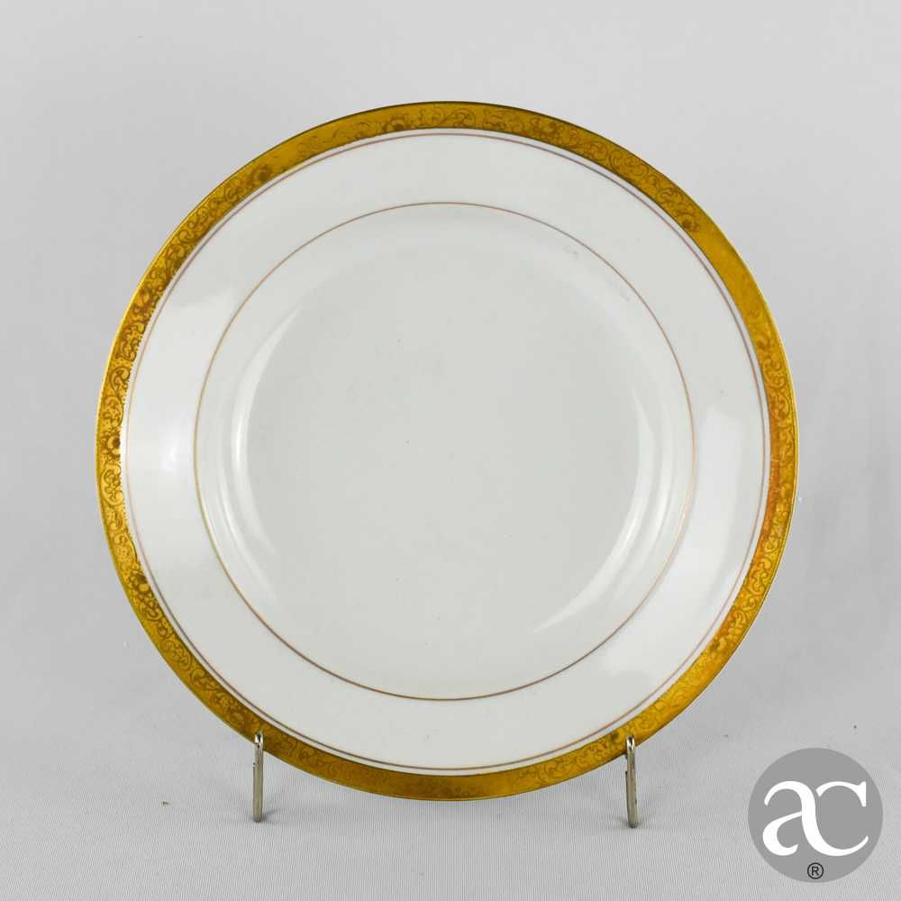 Conjunto de prato fundo e prato raso, porcelana Artibus, friso dourado