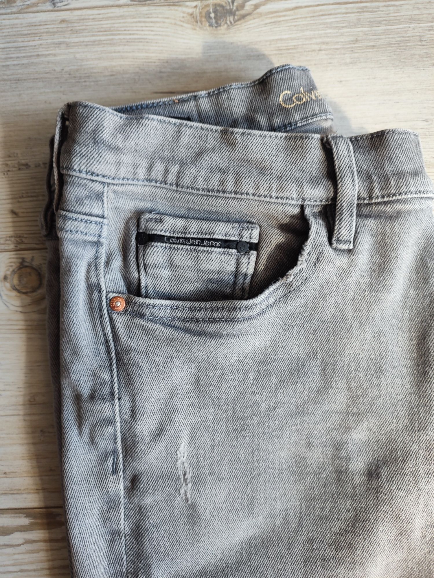 Calvin Klein Jeans szare Skinny High Rise r. 28/32