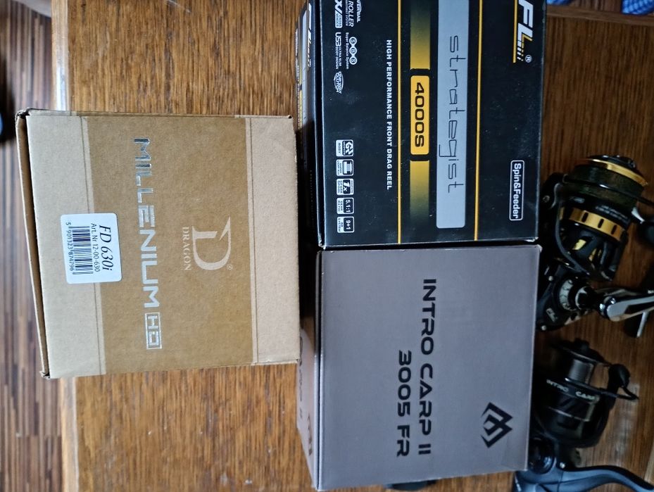 Kołowrotki wędkarskie nowe, i mały gratis, okazja!