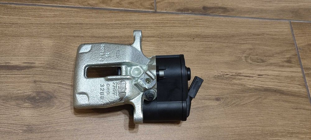 Супорт задній лівий на VW b6,B7,CC,Sharan,Tiguan Новий. 5N0 615 403