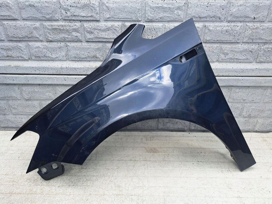 VW CADDY 4 IV 2015-2021 BŁOTNIK PRZEDNI LEWY