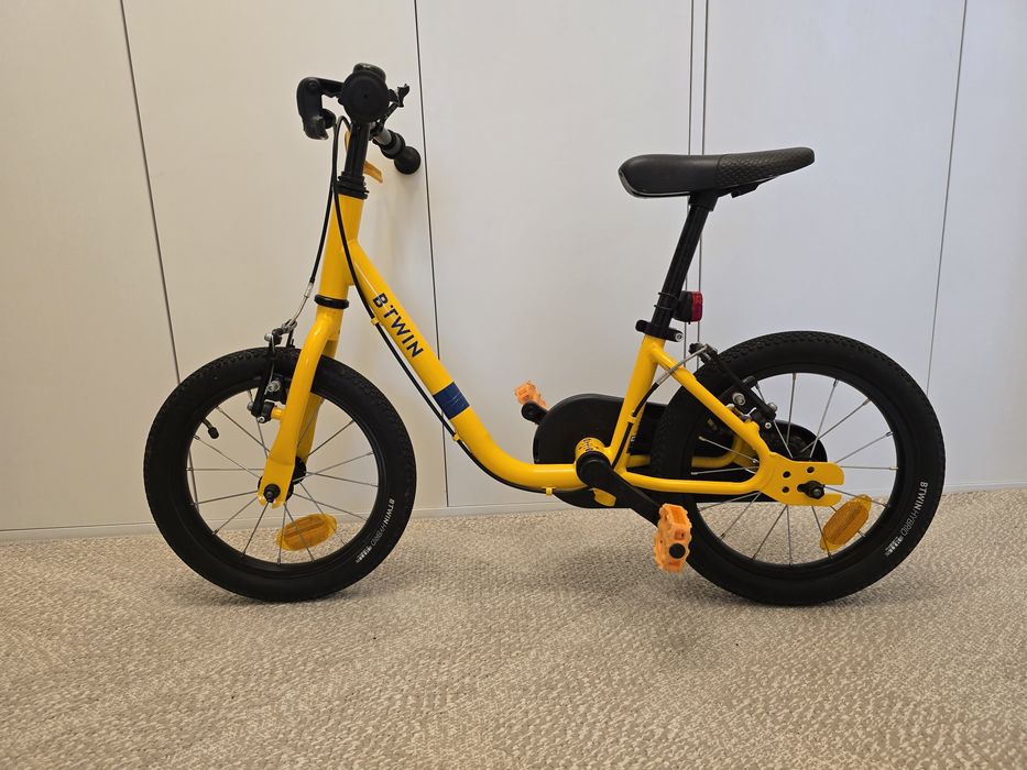 Rower dziecięcy BTWIN 14” – żółty, stan bardzo dobry