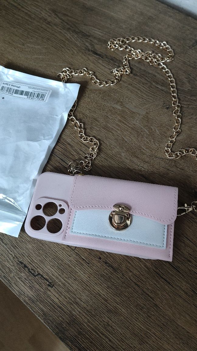 Nowe śliczne etui do iPhone 13 pro z odpinanym łańcuszkiem .