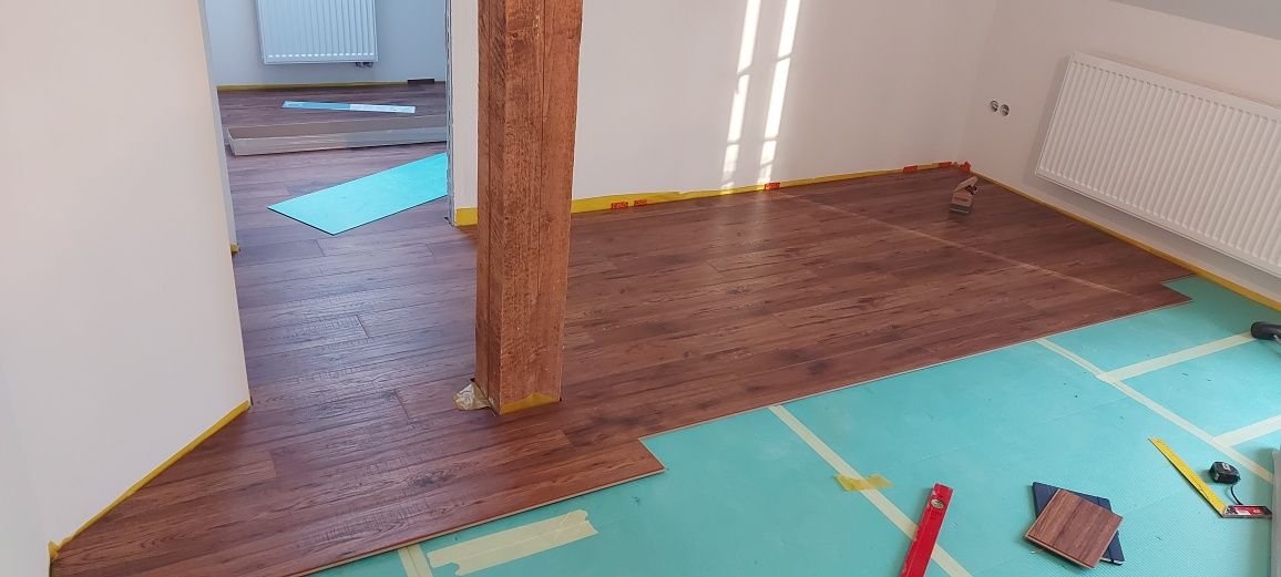 Prace remontowe, układanie paneli, oświetlenie LED
