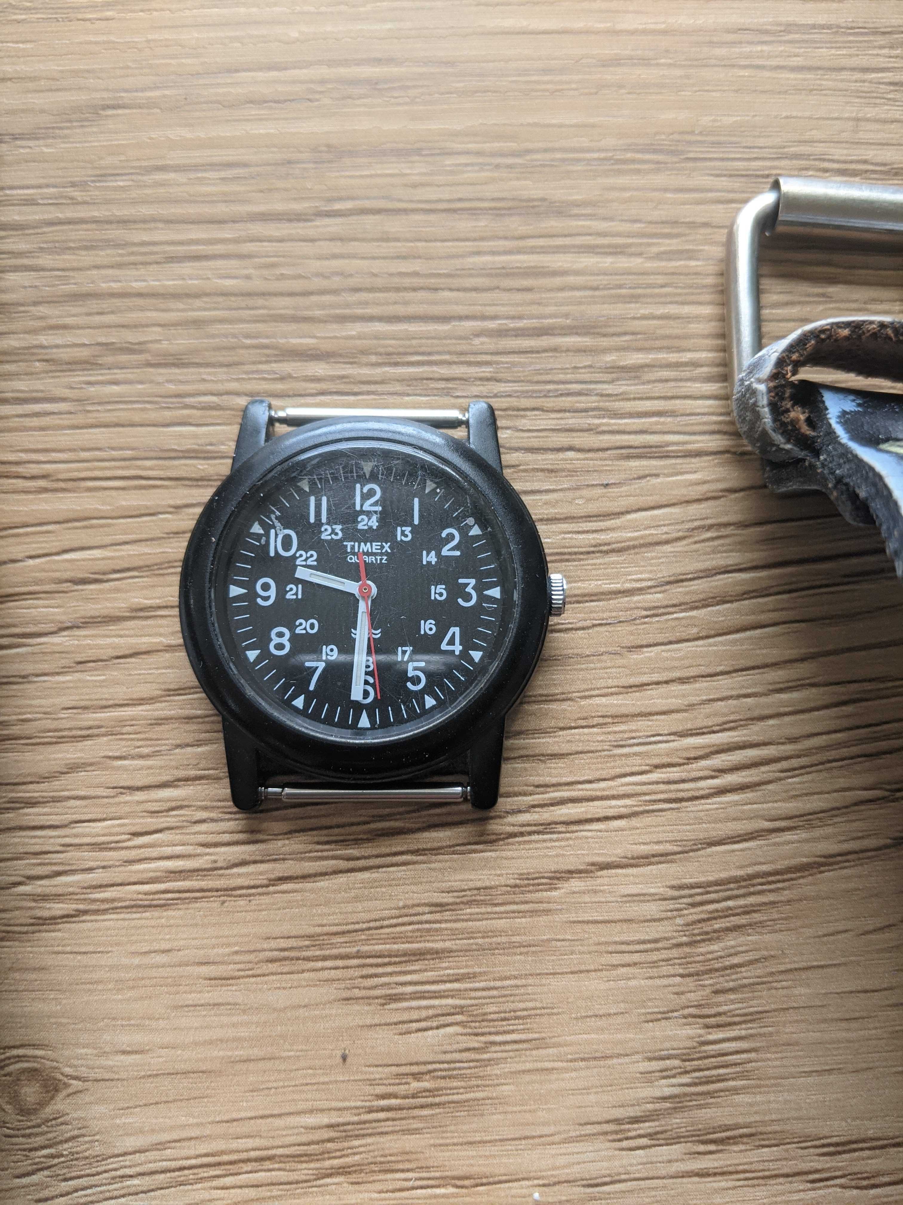 trzy zegarki na rękę, timex oraz inne