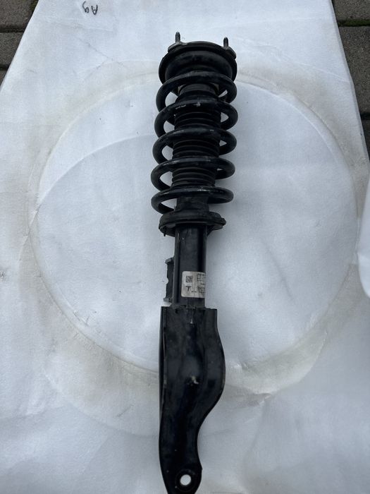 Tesla y Амортизатор передній правий 1288368-99-b