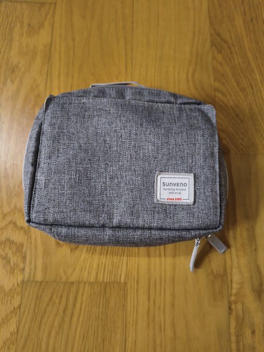 Organizer na chusteczki pieluchy pampersy do wózka dla niemowlaka