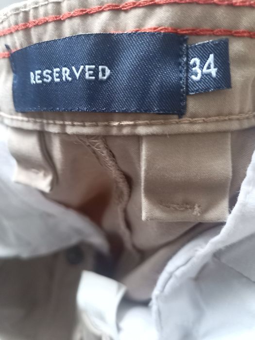Spodnie męskie  beżowe bawełna. Reserved