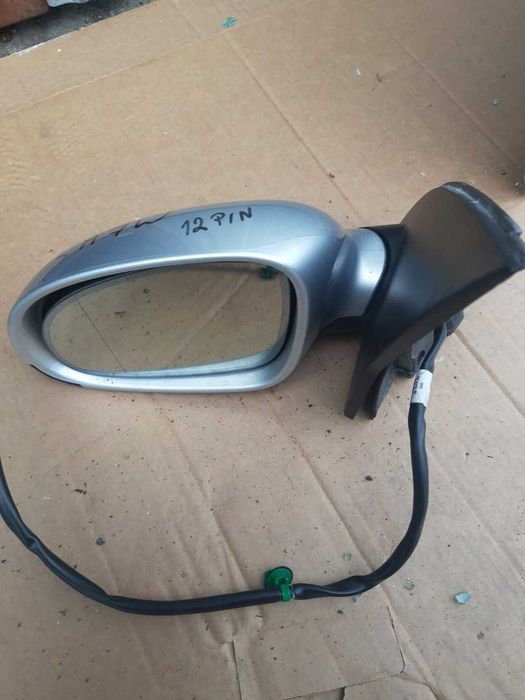 VW Golf V lusterko lewe 12 PIN lakier LA7W