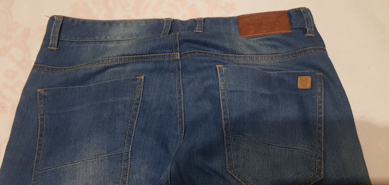 Spodnie jeansy Cropp