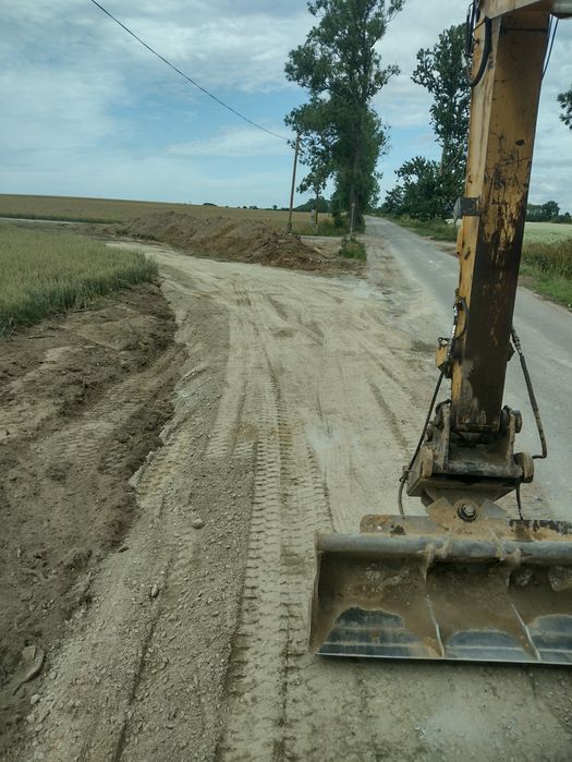 Koparka kop-ładowarka transport piasek kruszywo