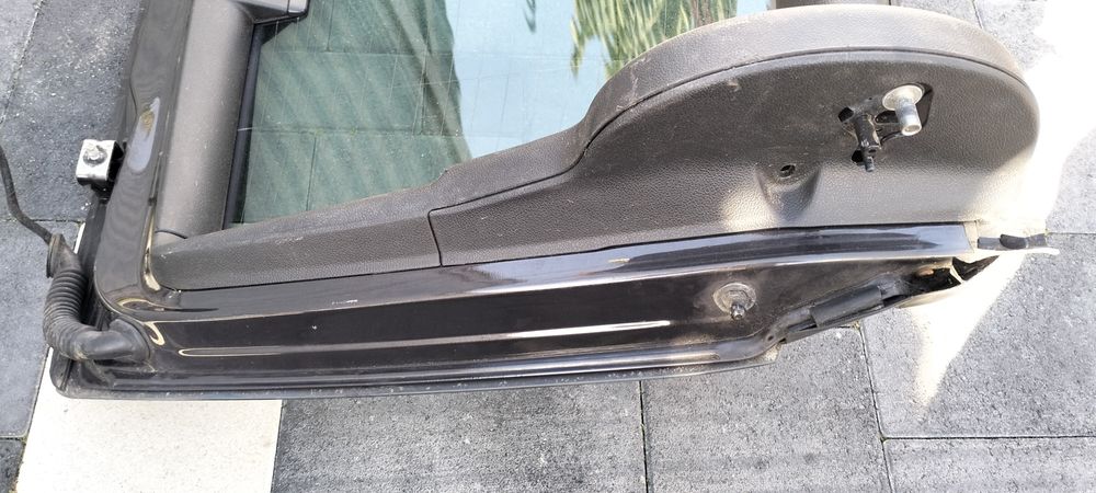 Заднє скло шкода суперб ліфбек 2010рік коричнева