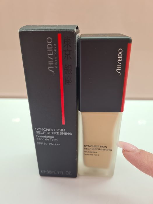 Тональний shiseido 210
