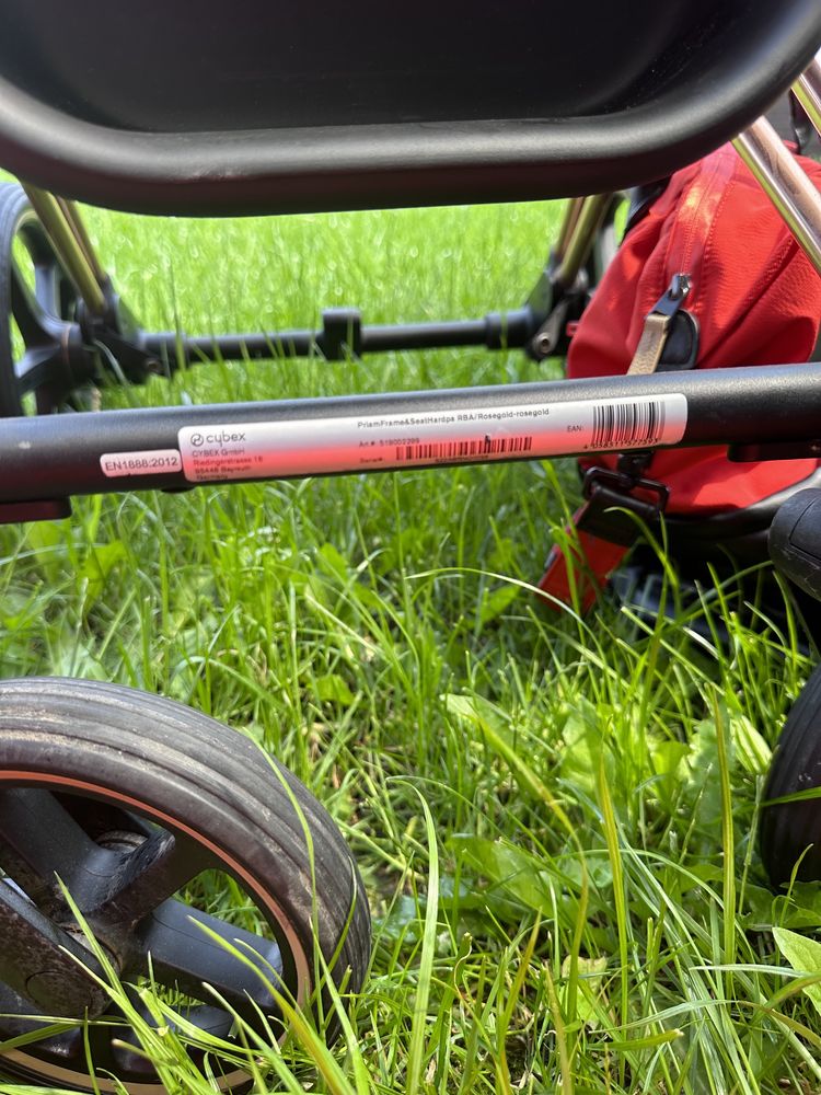 Cybex ярко оранжевая коляска