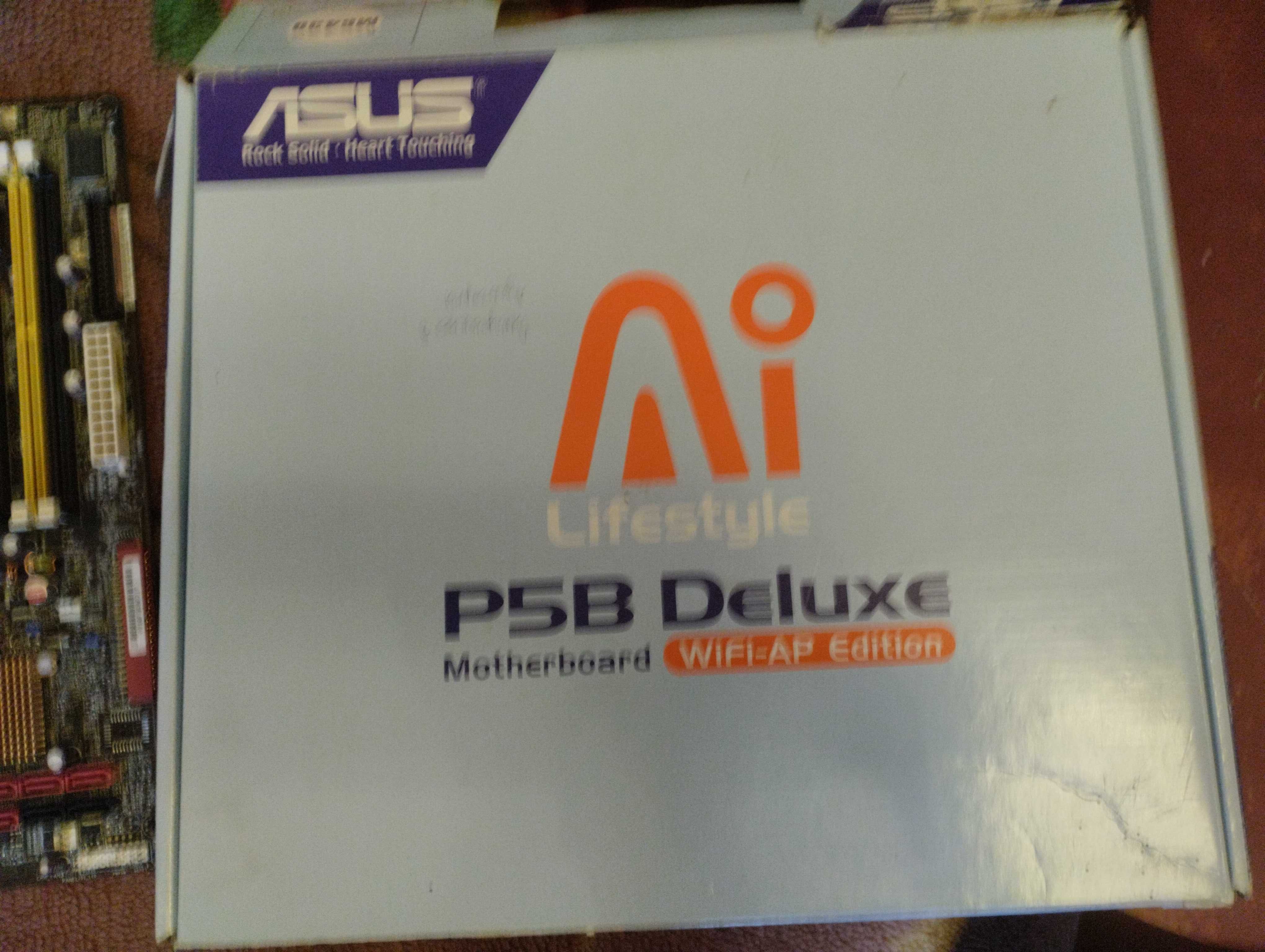 Продам материнскую плату Asus P5B-Delux ( комплект)