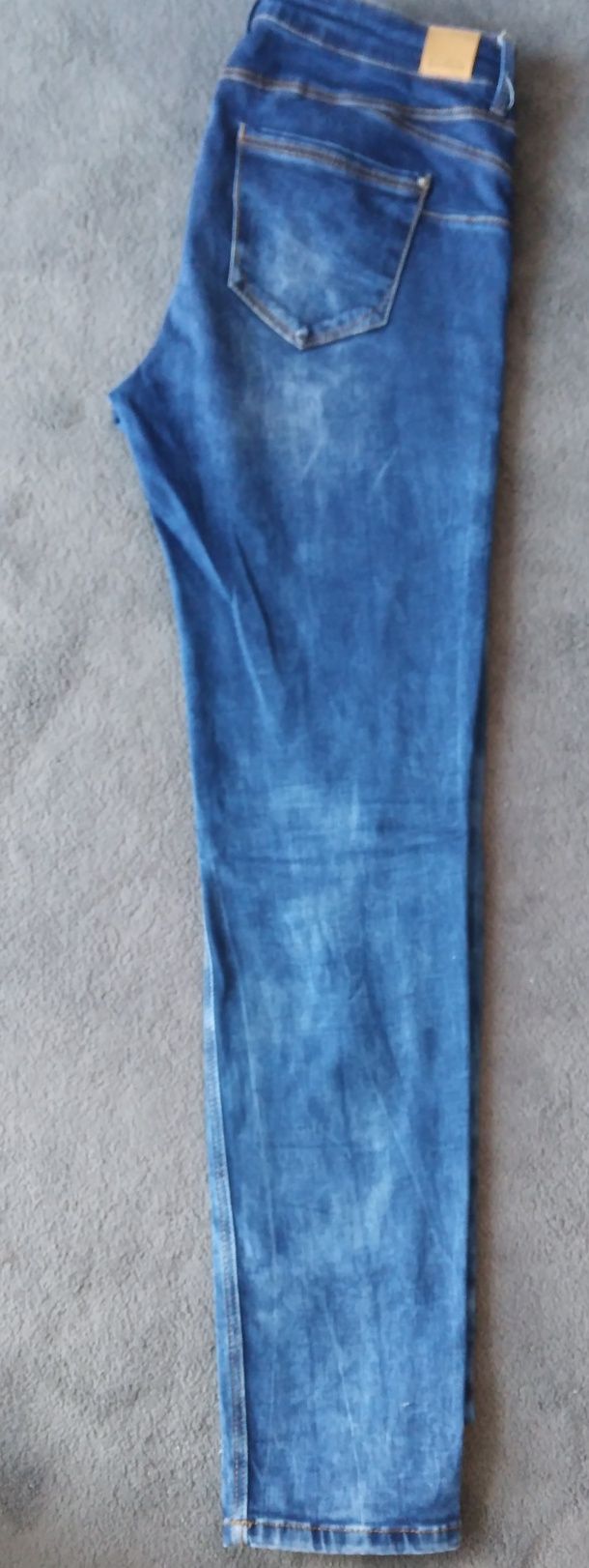 Spodnie jeans damskie Rozm. 42