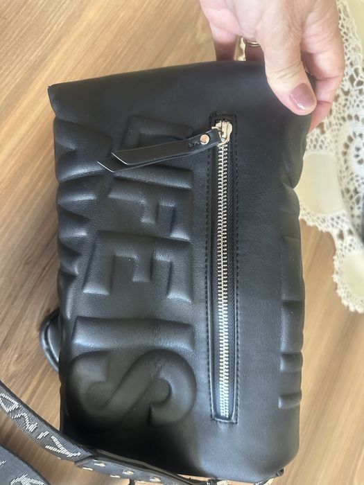 Bolsa desigual preta