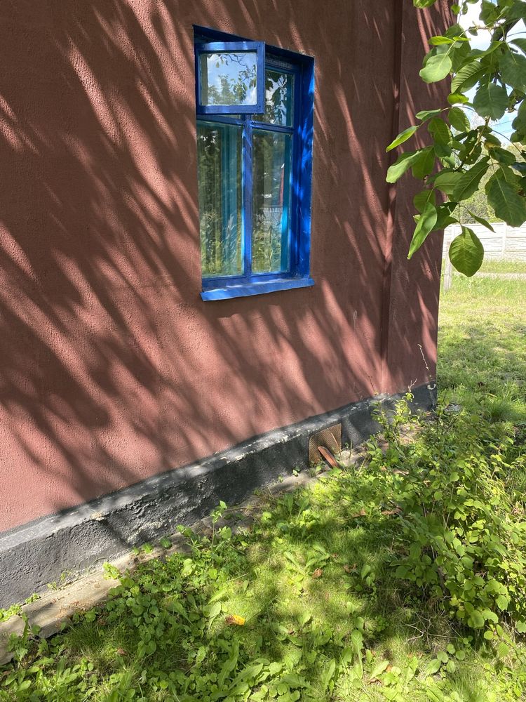 Продам будинок з приватизованою землею у черті міста