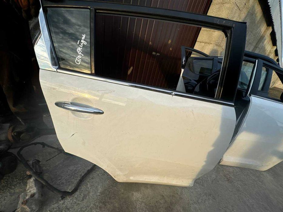 Двері до Kia Sportage 3 (ціна за шт.)