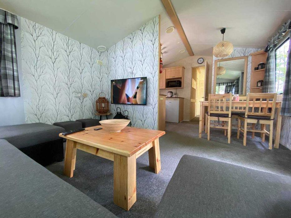 Domek nad jeziorem Ublik Wyszowate linia brzegowa pomost łódka